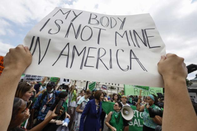 protesters gather outside of the US Supreme Court after Roe v. Wade is overturned