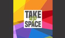 picture of a mosaic with rainbow colors with the words "Take Up Space" in the middle